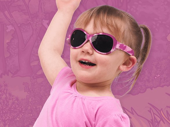 Toddler wearing BANZ sunglasses and sun protection gear