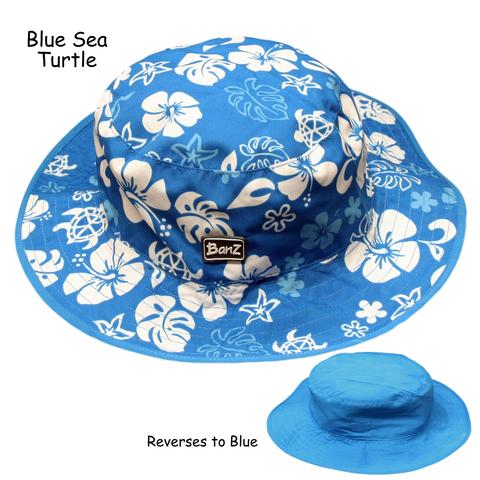 Blue bucket hat with white floral patterns on a white background