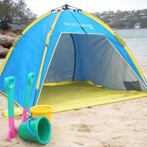BANZ Global Umbrella Shelta Sun Shelter UV Tent - the tent set up on the beach with no children inside